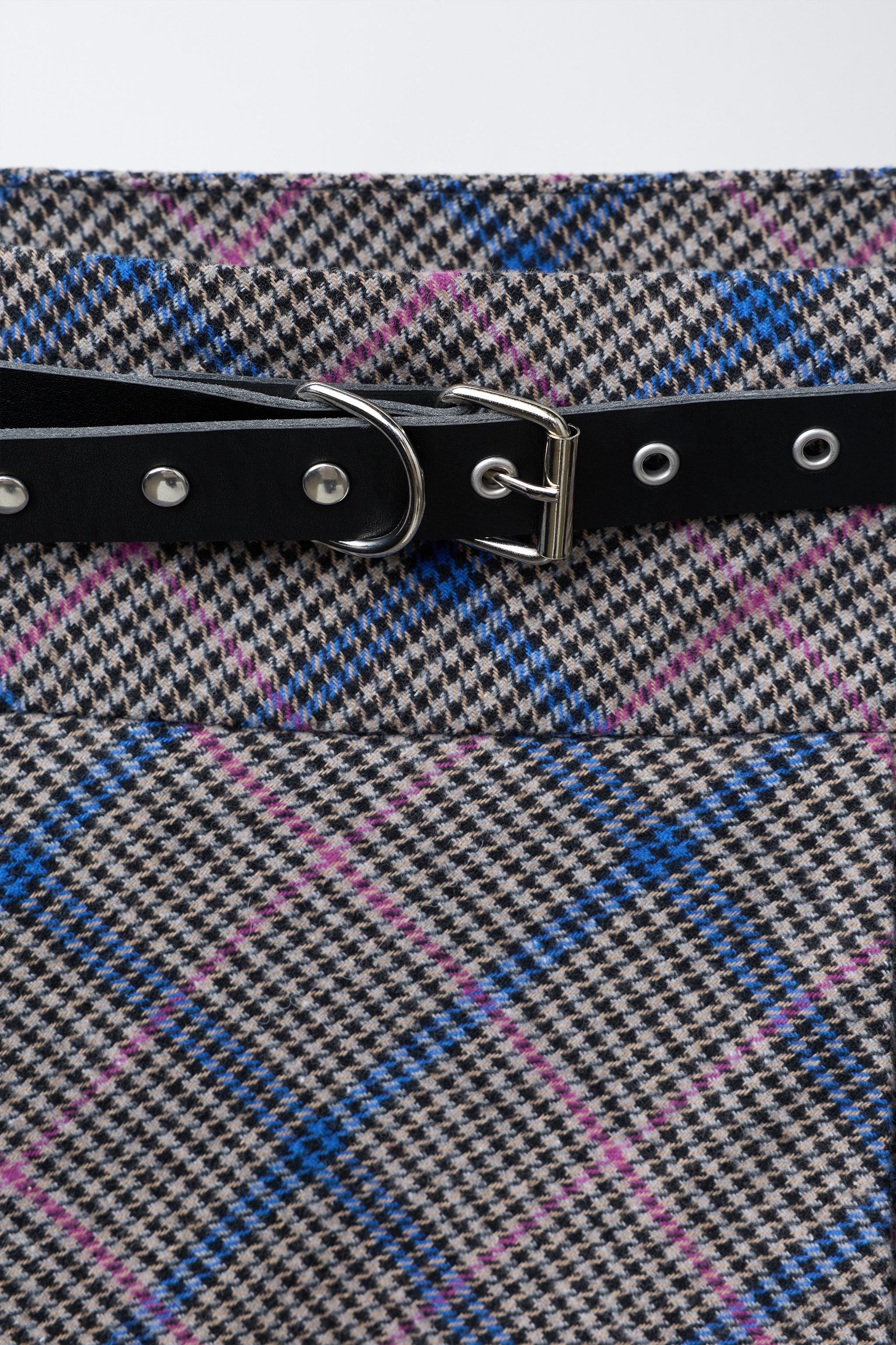 PLAID PLEATED SKIRT WITH STUDDED BELT